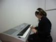 Alumna 11 años tocando piano con " Método SoftMozart"